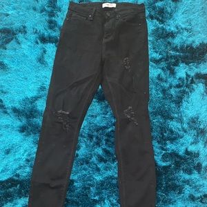 Black distressed skinny jeans